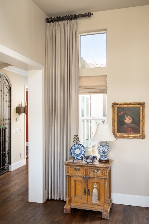 Roman shade with decorative side panel