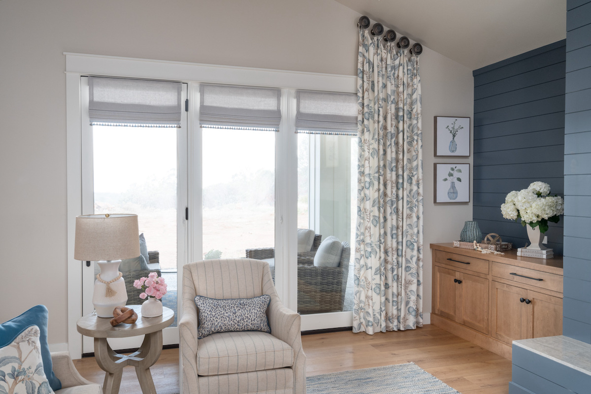Three french door Roman shades with accent drape